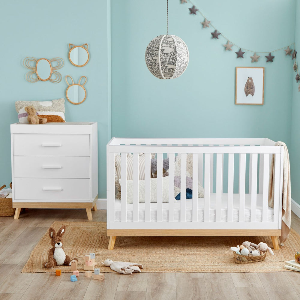Babymore Mona 2-Piece Nursery Room Set in a nursery with teal walls