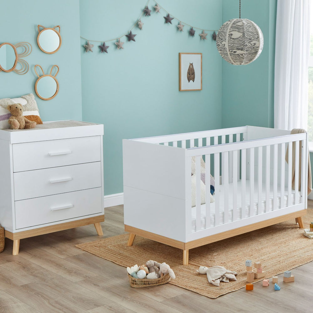 Angled photo of Babymore Mona 2-Piece Nursery Room Set in a nursery