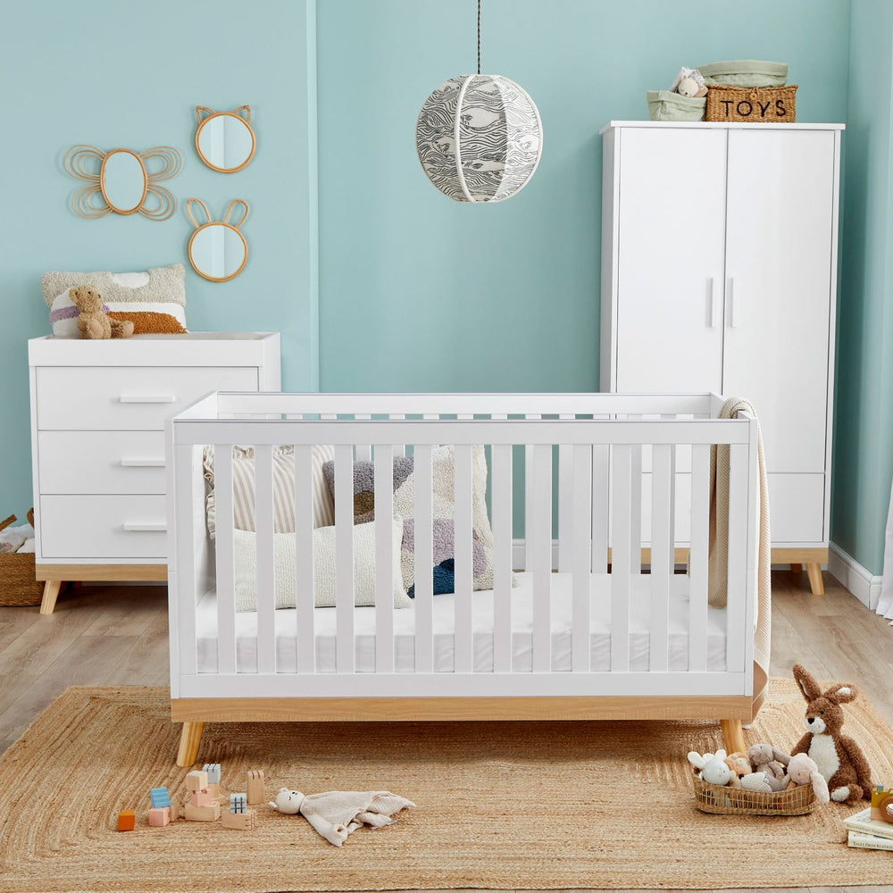 Babymore Mona 3-Piece Nursery Room Set in a nursery room with teal walls