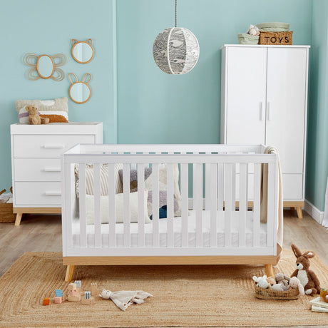 Babymore Mona 3-Piece Nursery Room Set in a nursery room with teal walls