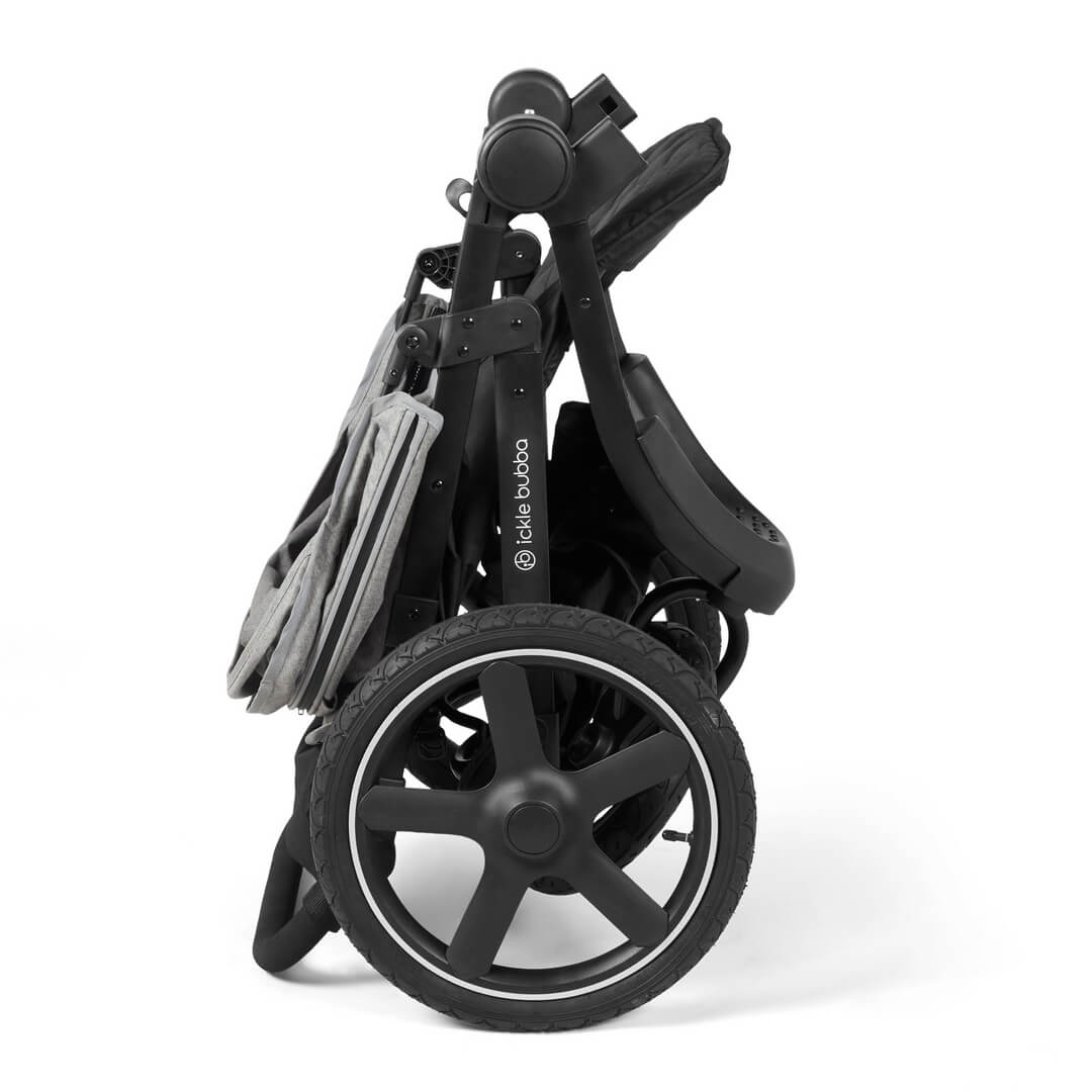 Compact and folded Ickle Bubba Venus Prime Jogger Stroller in Space Grey colour