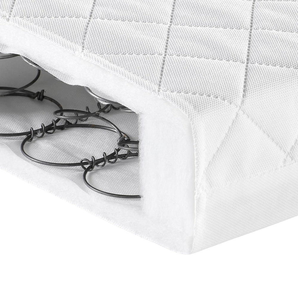 corner shot of Babymore Deluxe Sprung Cot Bed Mattress in 140 x 70 cm size