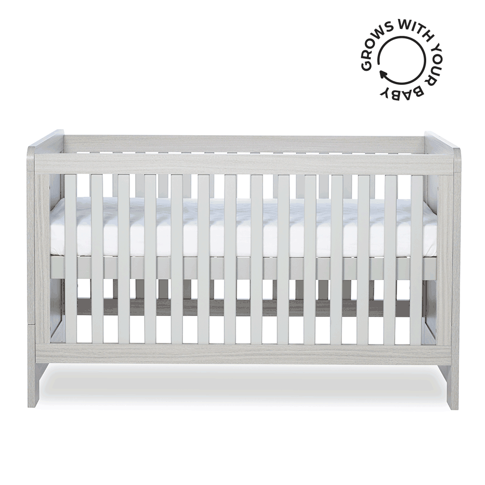 An animated white Ickle Bubba Pembrey Cot Bed in different mattress height positions