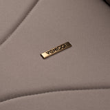 Close-up shot of Venicci logo in Claro carrycot in Almond colour