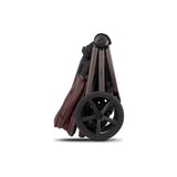 Side view of folded frame of Venicci Upline 2 Special Edition (SE) in Burgundy colour